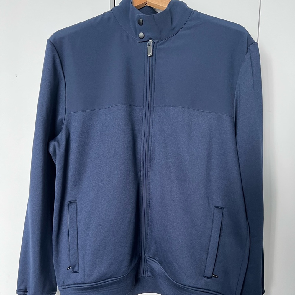 Jack Nicklaus golf jacket used once. Medium  but wears bigger closer to a large